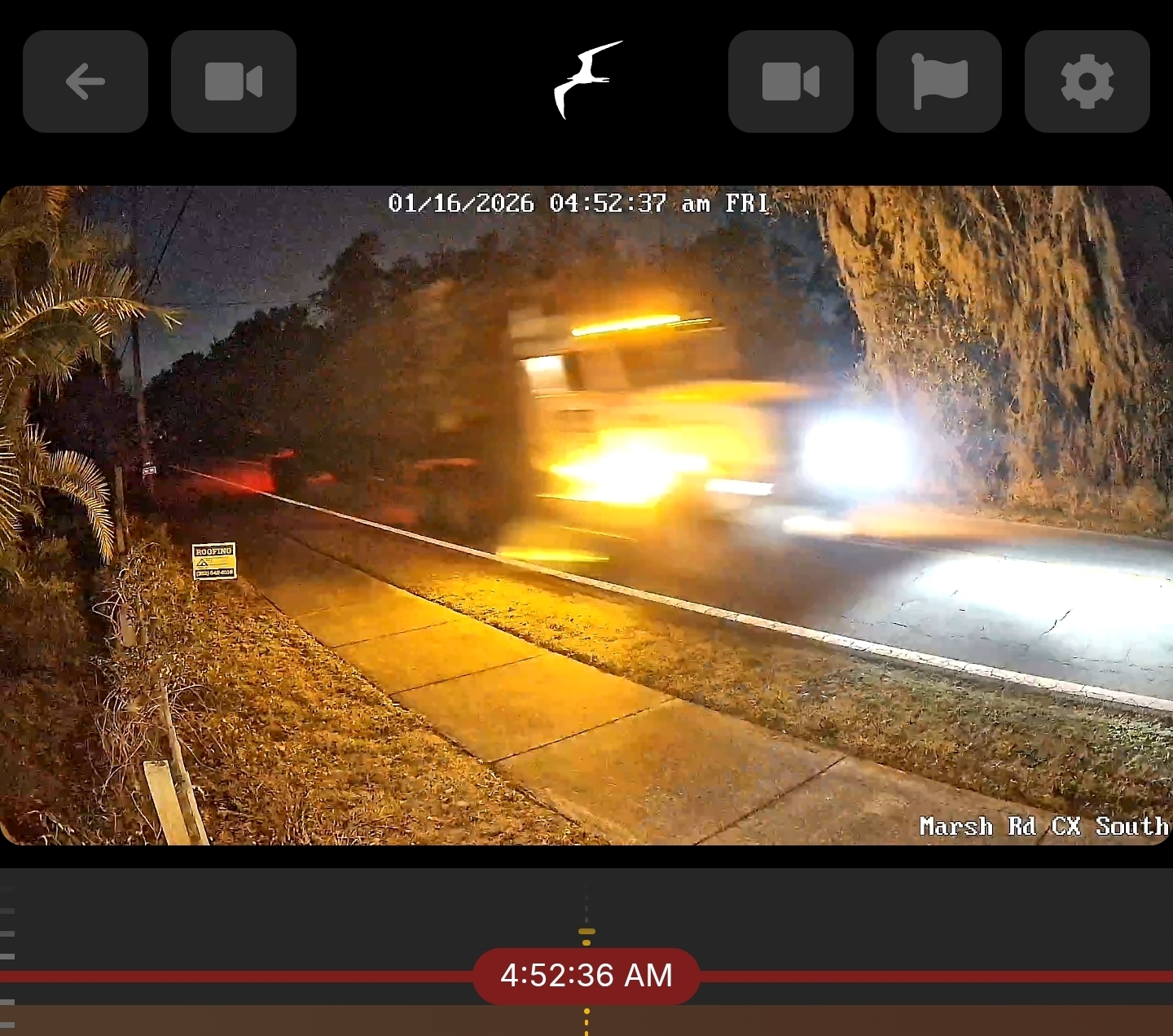 Fully loaded logging truck on Marsh Road at night — approximately 40 tons