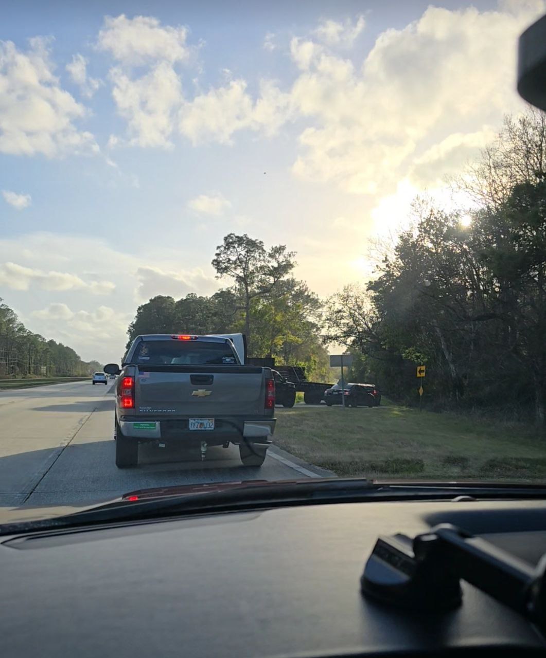 Truck blocking entrance at US-92 intersection causing traffic backup