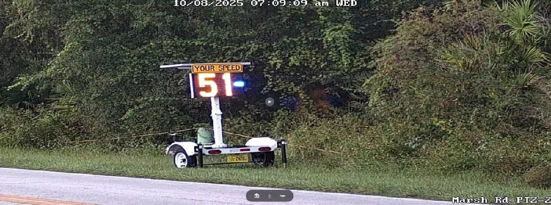 Speed radar showing 51 MPH on residential Marsh Road